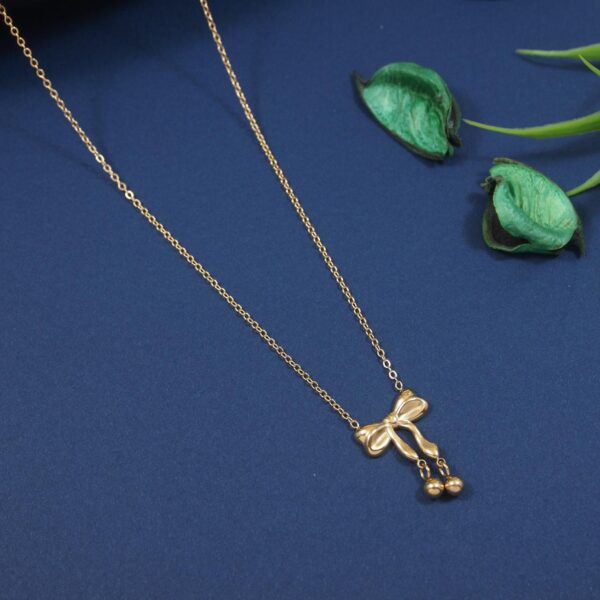 The Golden Bow & Bell Necklace – Anti-Tarnish Finish